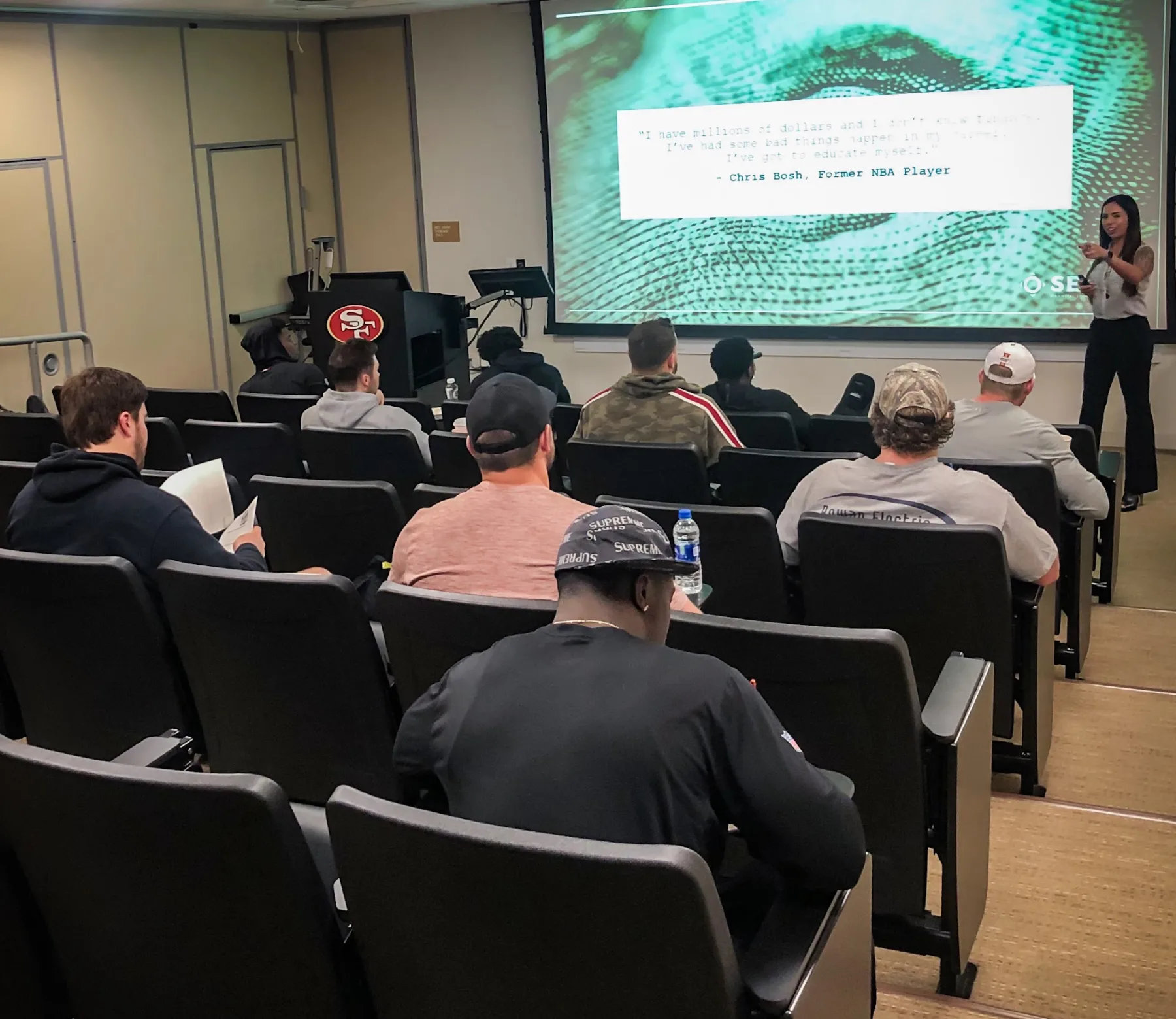 Hillary Seiler leading a financial wellness workshop for employees